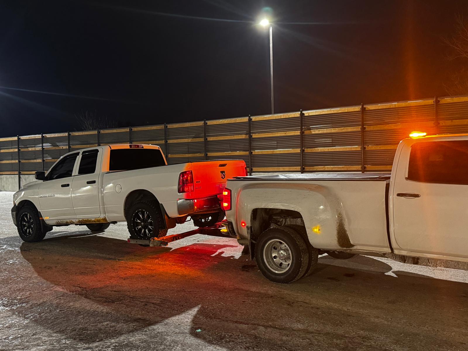 Orca Towing truck and operator on the job